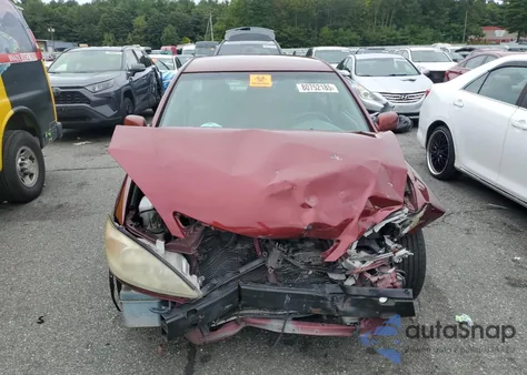 2002 Toyota Camry Le z USA, uszkodzony, nr VIN 4T1BF32K02U023924